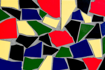 mosaic with colored tiles on a wall as background