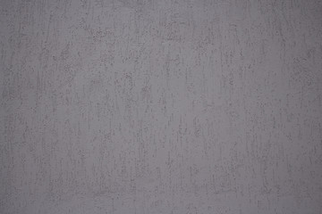 gray striped textured plaster woodworm texture of the wall