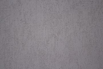 gray striped textured plaster woodworm texture of the wall