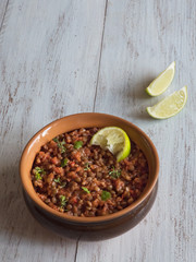 Stewed lentils with vegetables. Rustic food.