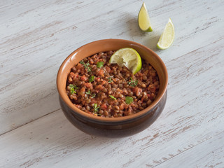 Stewed lentils with vegetables. Rustic food.
