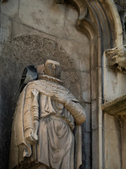 Close up of statue decorated at entrance of Aix Cathedral (Cathédrale Saint-Sauveur d'Aix-en-Provence) in Aix-en-Provence. Aix Cathedral was Built and re-built from the 12th until the 19th century.