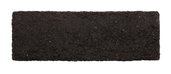 Black soil frame isolated on white background. Rectangle shaped humus. 