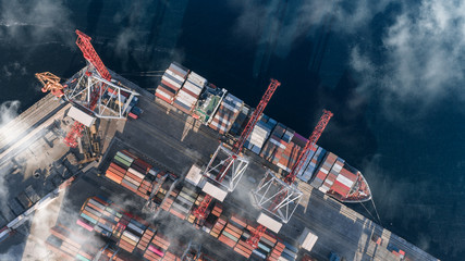 Container cargo ship in import export business logistic, Freight transportation, Aerial view.