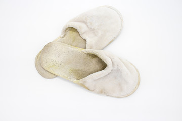 Old white hotel slippers