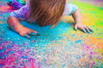 Little girl dirty of paint