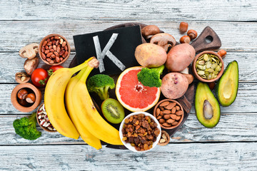 Foods containing natural potassium. K: Potatoes, mushrooms, banana, tomatoes, nuts, beans,...