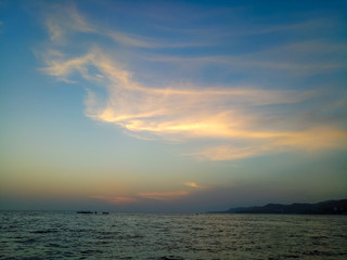 Amazing sea sunset, the sun, waves, clouds