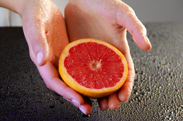 grapefruit in the hands