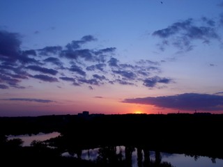 Naklejka premium sunset over lake