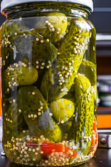 Pickled cucumbers in a glass jar
