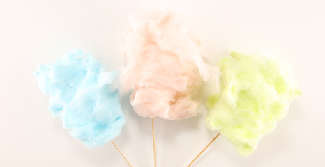 colorful cotton candy floss. sweet party food in pink and green