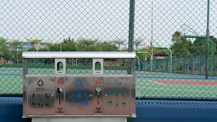 The bin next to the basketball court