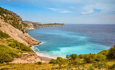 Naklejka na ściany i meble Scenic mountainous landscape with Coll Baix beach on Mallorca, Spain.