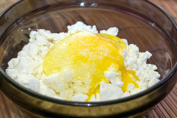 raw egg in sugar with cottage cheese