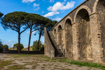 Fototapeta na wymiar Ruins of the arena of the Roman city Pompeii destroyed by Vesuvius.