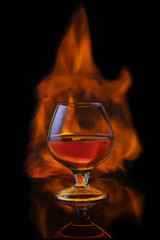 Burning alcoholic drinks  on black background