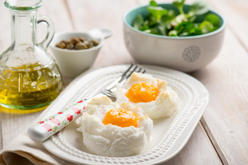 owen eggs eith salad capers and olive oil