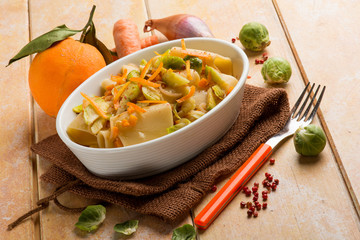 pasta with brussel sprouts pink pepper and orange peel