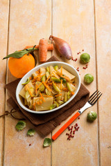 pasta with brussel sprouts pink pepper and orange peel