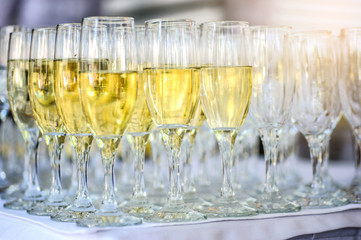 close up photo of glasses of champagne on the table