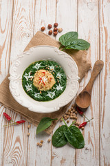 spinach and chickpeas soup with hazelnuts