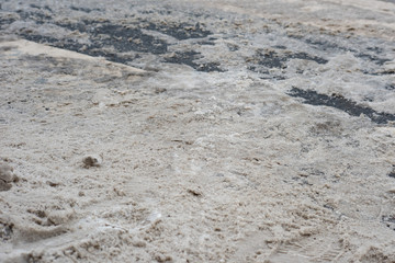 Crosswalk littered with snow and ice