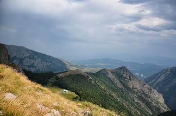 Fototapeta na wymiar Mountain hut Rai (Paradise) near raisko praskalo waterfall and Botev peak. Central balkan national park, Stara planina mountain, Bulgaria