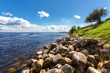 View of the Ladoga lake, boulders and the Oreshek fortress