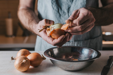 The process of cleaning the onion peel layer by layer - tears from slicing onions
