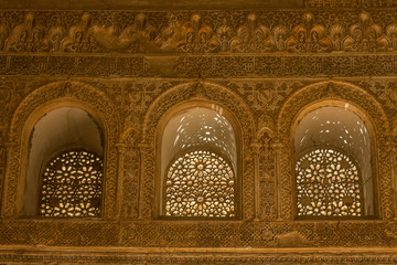Fototapeta na wymiar Arches and decorative details of the Alhambra in Granada. Spain
