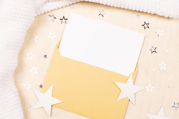 Letter in an envelope decorated with stars.