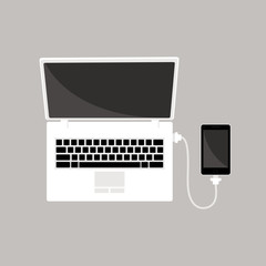 Mobile smartphone plugged and charging from laptop usb port. Vector illustration laptop and phone in flat style