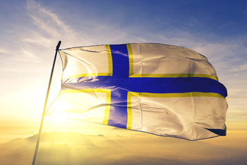 Bayamon municipality of Puerto Rico flag waving on the top sunrise mist fog