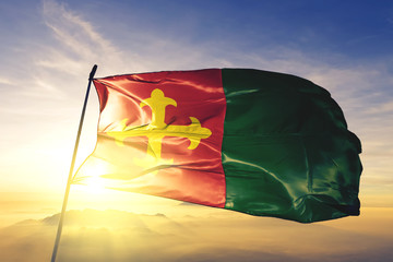 Ceiba municipality of Puerto Rico flag waving on the top sunrise mist fog