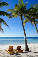 Wooden Beach Chairs on Palm Tree Island, Panglao - Bohol, Philippines