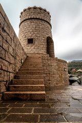Fototapeta premium View of the watchtower over the sea in the town of Recco, Genoa.