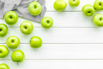summer fruit pattern with apples on light wooden background top view copyspace