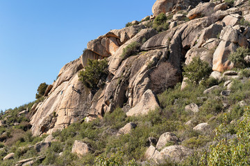 Panoramic view of granite rocks in La Pedriza, National Park of mountain range of Guadarrama in Manzanares El Real, Madrid, Spain.