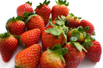 Close up of a pile of fresh juicy strawberries