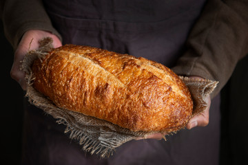Chef with Artisan rustic handmade bread 