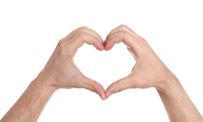 Man making heart with his hands on white background, closeup
