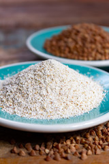 Healthy diet superfood buckwheat groats and flour used for making delicious pasta, noodles, pancaces and kasha in many countries.