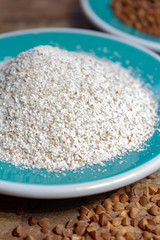 Healthy diet superfood buckwheat groats and flour used for making delicious pasta, noodles, pancaces and kasha in many countries.