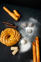 a set of sweets: chocolate cookies, sweets, pastila, and quiche