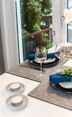 Beautiful modern interior design. Apartment inside view. A wine bottle on the table.