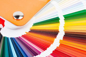 The catalog of paints with a various color palette, close-up