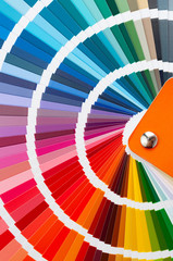 The catalog of paints with a various color palette, close-up