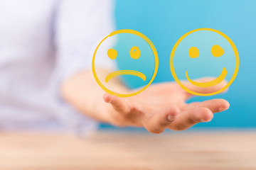 mood smiley in hand