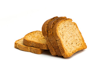 Sliced brown bread isolated on white background.